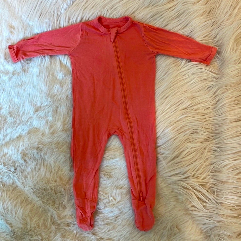 Kyte Baby zippered footie in Melon